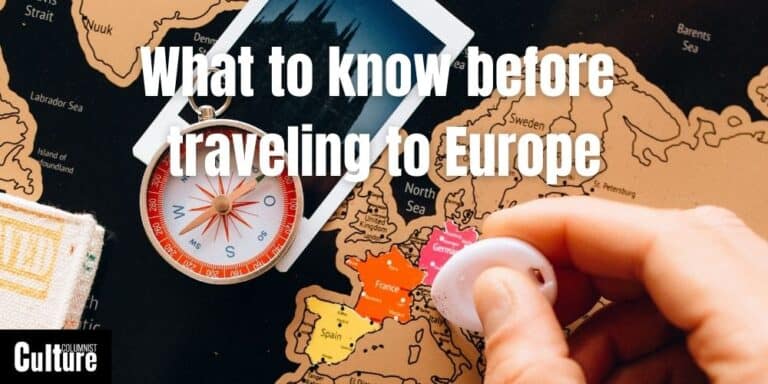 person planning trip to europe with map
