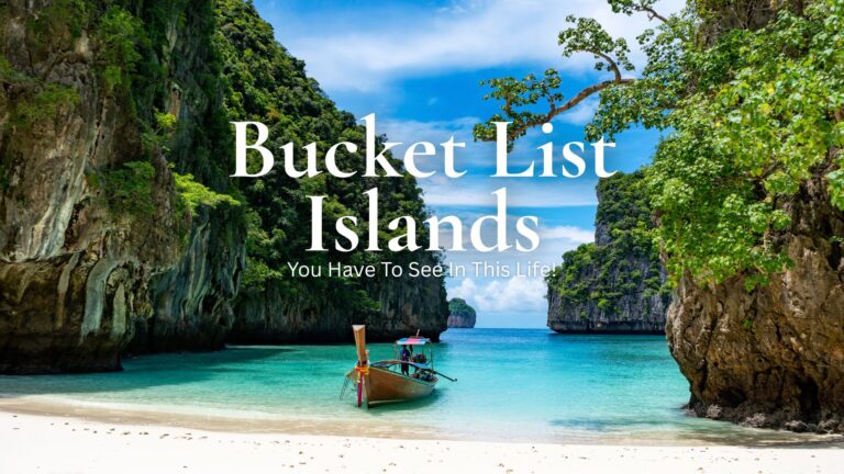 A serene tropical beach features clear turquoise waters gently lapping against a sandy shore, framed by towering limestone cliffs adorned with lush greenery. A traditional wooden boat, brightly decorated, is anchored close to the shore, inviting exploration of this picturesque island paradise under a vibrant blue sky with wispy clouds.